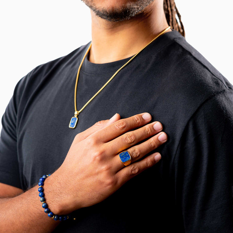 Gold Signet Ring with Lapis Lazuli, on model + matching chain necklace with lapis lazuli pendant + matching bracelet with Lapis Lazuli beads